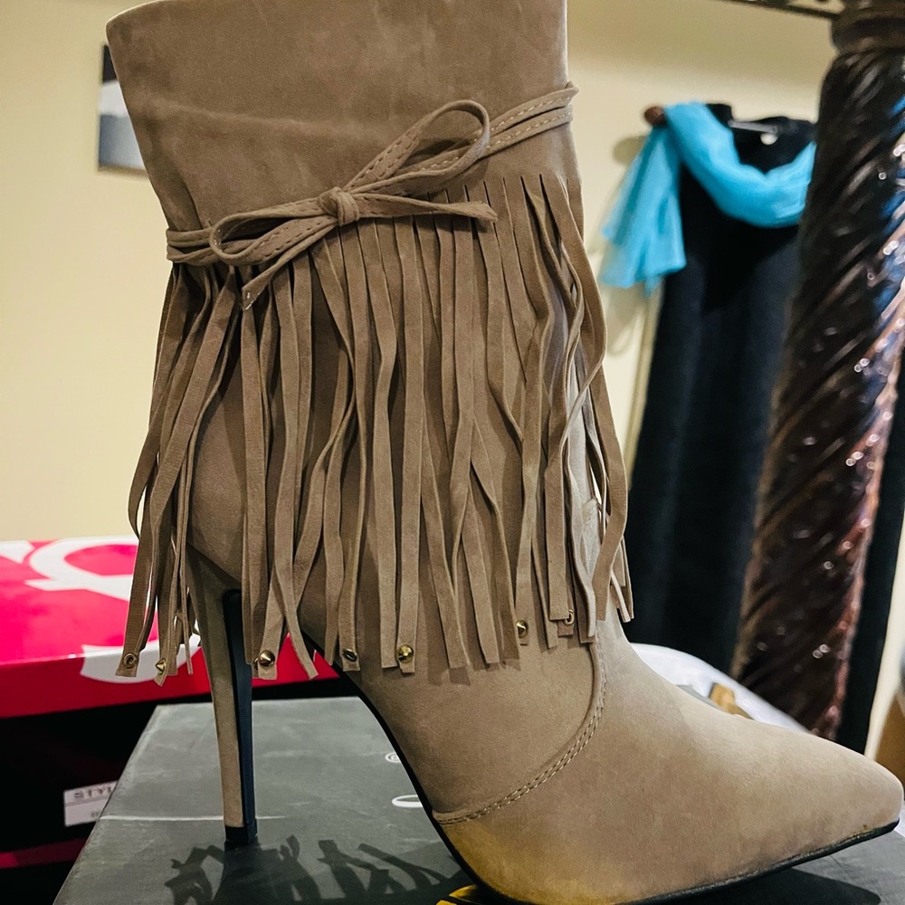 High heeled fringe bootie by Machi